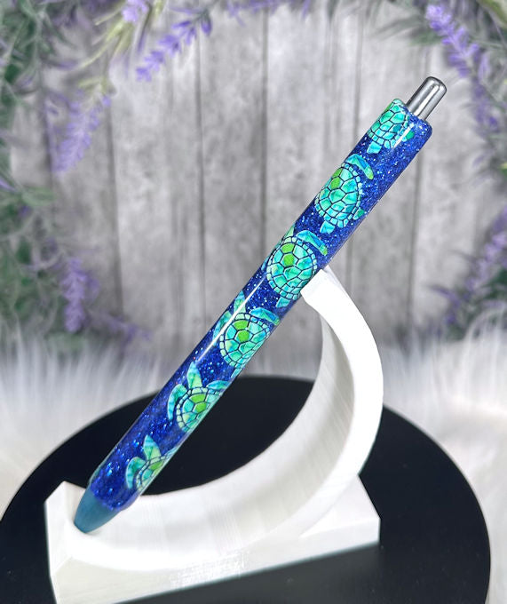 Handmade Sea Turtles on blue glitter pen with free refill