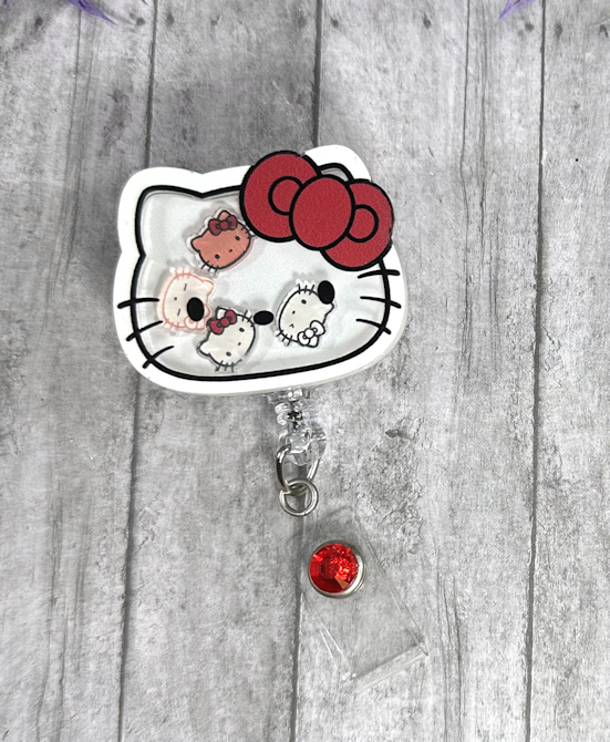 Handmade Hello Kitty Shaker Badge Reel
