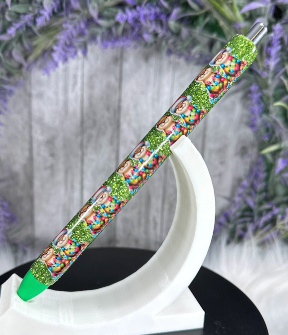 Handmade Christmas Otters on green glitter pen with free refill