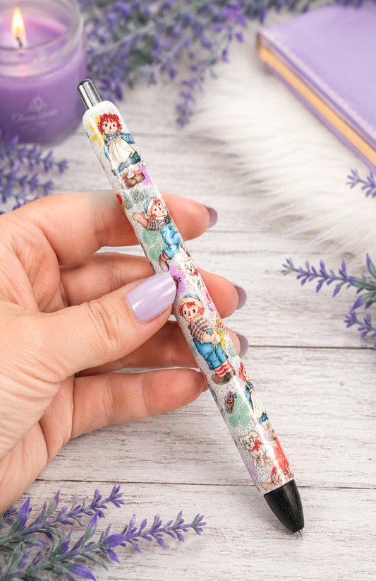 Handmade Raggedy Ann and Andy glitter pen with free refill